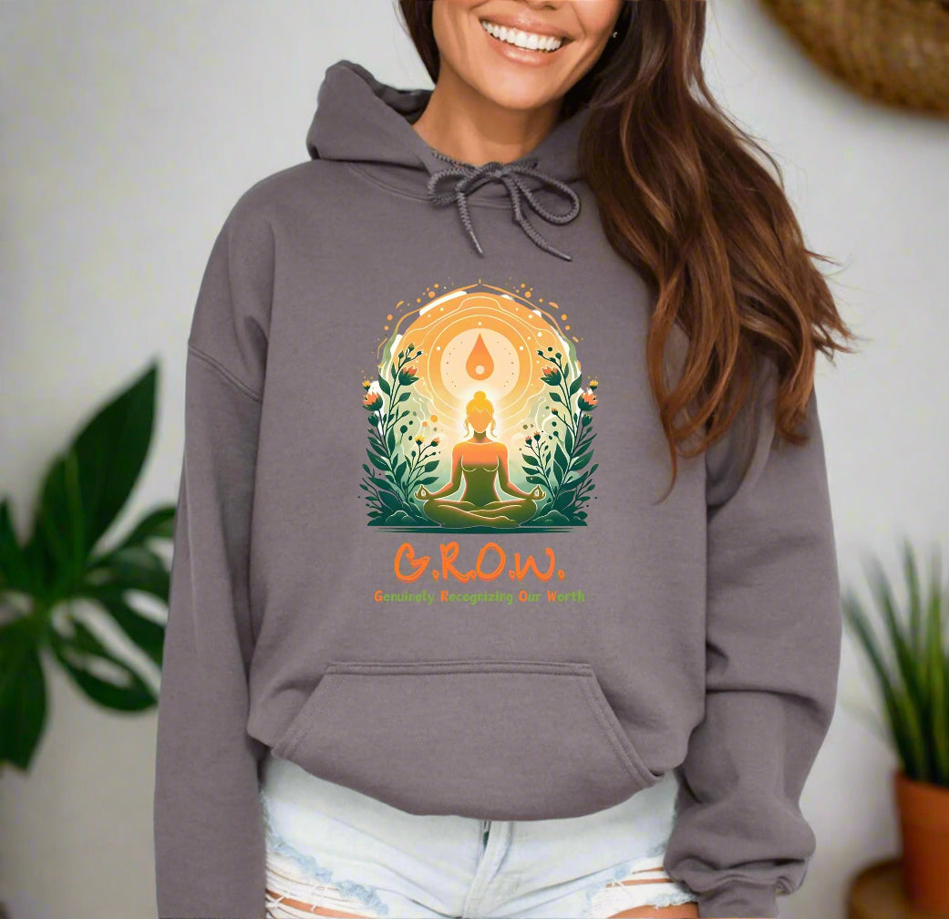 a woman wearing a grey hoodie with the words grow on it