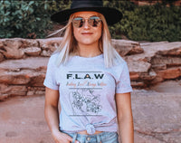 Thumbnail for a blonde woman wearing a black hat and sunglasses