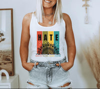 Thumbnail for a woman wearing a white tank top with the words hate on it