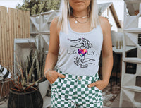 Thumbnail for a woman wearing a tank top and checkered shorts