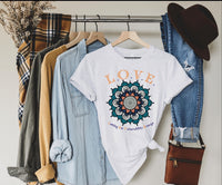 Thumbnail for a t - shirt and jeans hanging on a rack