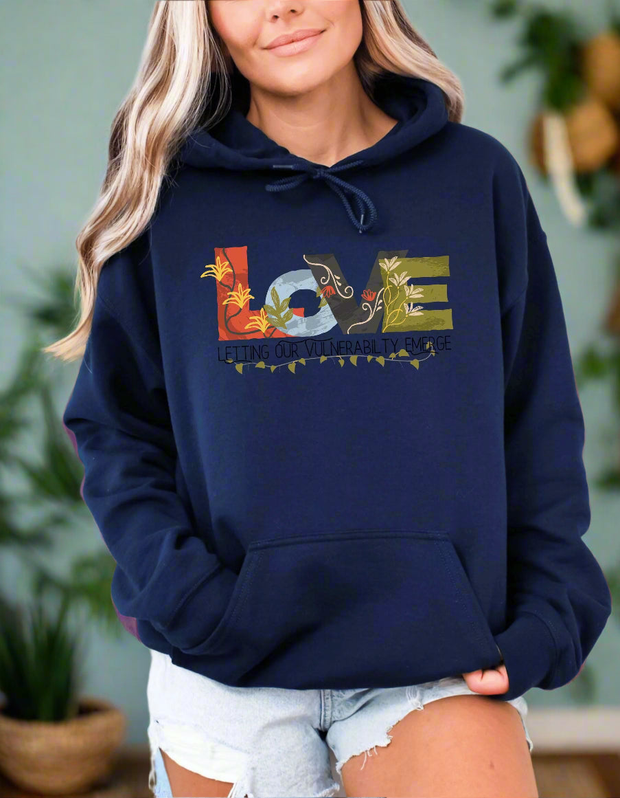 a woman wearing a blue hoodie with the word love on it