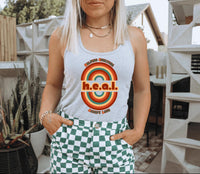 Thumbnail for a woman wearing a tank top and checkered shorts