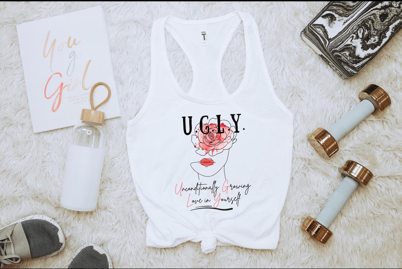 a women's white tank top with the words ugly on it