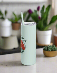 Thumbnail for a green tumbler cup with a straw sticking out of it