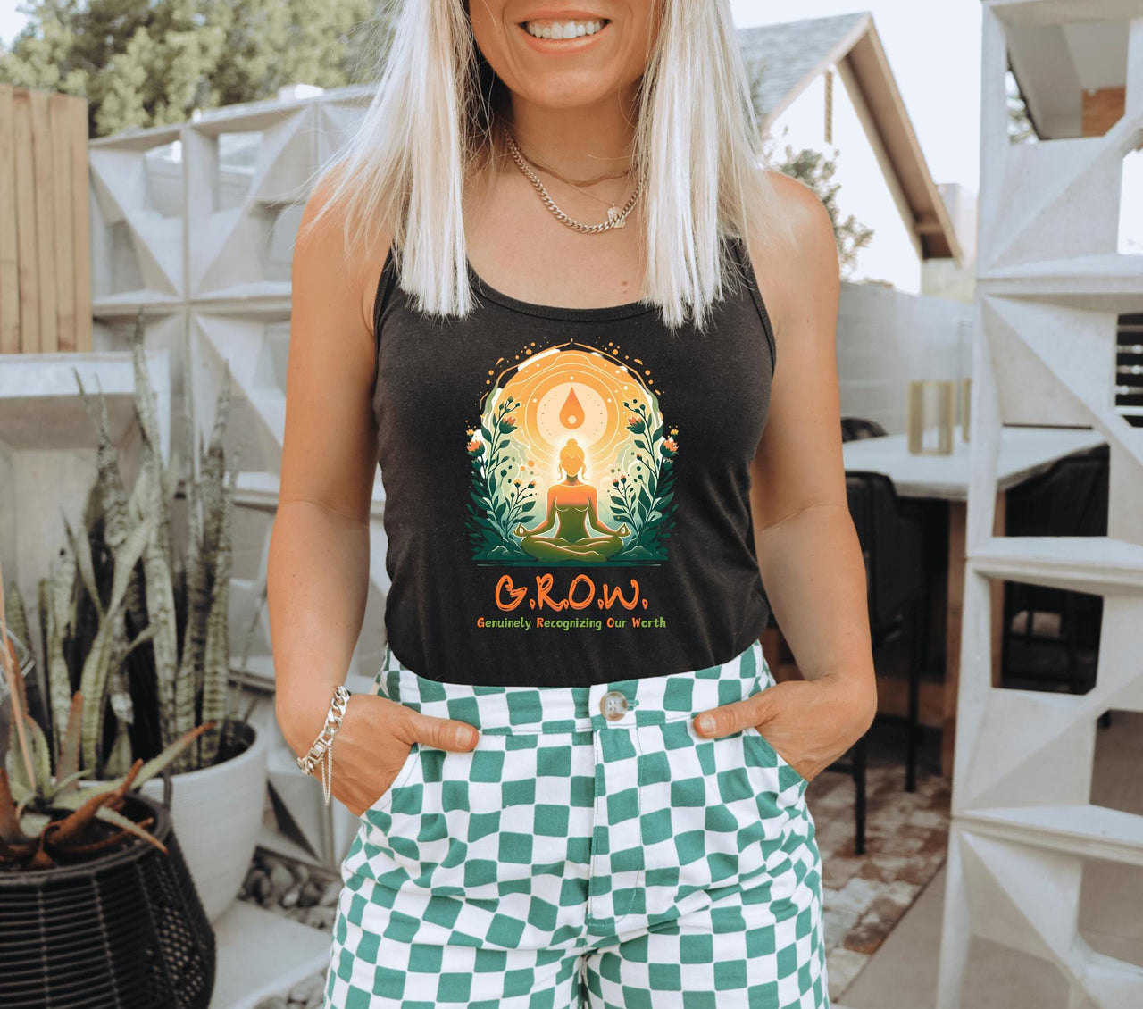 a woman wearing a black shirt and green checkered shorts