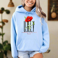 Thumbnail for a woman wearing a blue hoodie with a red flower on it