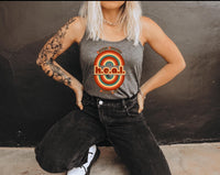 Thumbnail for a woman sitting on the ground with her hands on her hips