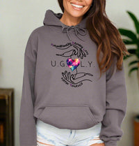 Thumbnail for a woman wearing a grey hoodie with a heart on it