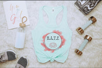 Thumbnail for the contents of a women's tank top laid out on a bed