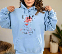 Thumbnail for a woman wearing a blue hoodie with a rose on it