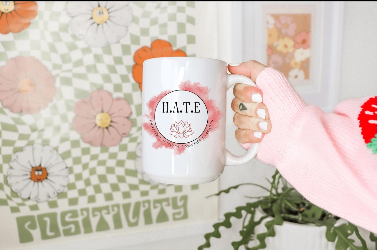 a woman is holding a coffee mug in her hand