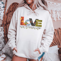 Thumbnail for a woman wearing a white love hoodie