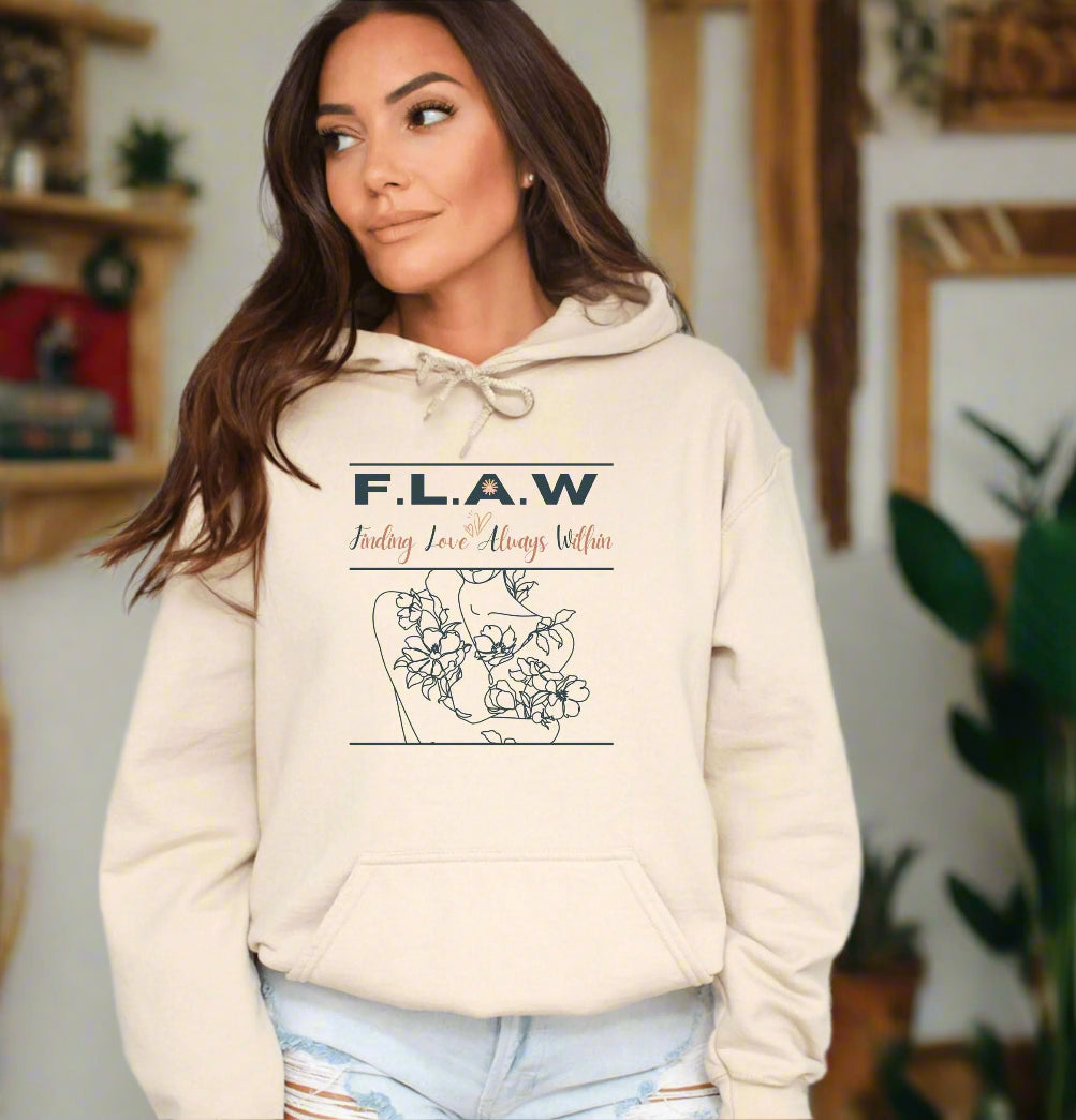 a woman wearing a white hoodie with a flower graphic on it