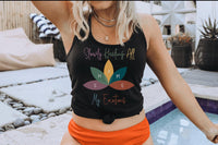 Thumbnail for a woman in an orange skirt and a black tank top