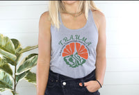 Thumbnail for a woman standing next to a plant wearing a tank top