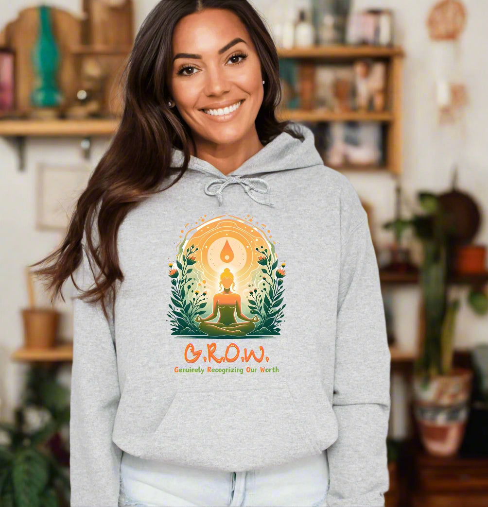 a woman wearing a grey hoodie with the words grow on it