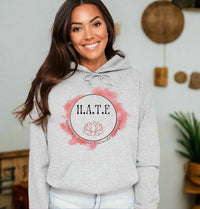 Thumbnail for a woman wearing a grey hoodie with the word hate on it