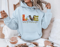 Thumbnail for a woman sitting on a chair wearing a blue hoodie