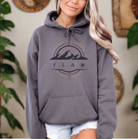 Thumbnail for a woman wearing a gray hoodie with a mountain scene on it