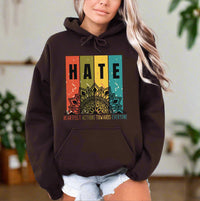 Thumbnail for a woman wearing a brown hoodie with the words hate on it