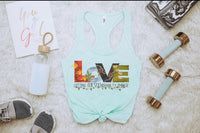 Thumbnail for a women's tank top and other items laid out on a bed