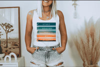 Thumbnail for a woman in a white tank top is holding her hands in her pockets