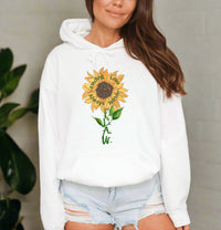 Thumbnail for a woman wearing a white hoodie with a sunflower on it