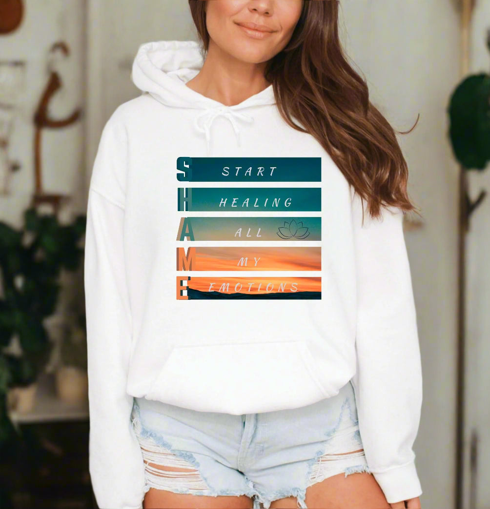 a woman wearing a white hoodie and shorts