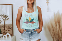 Thumbnail for a woman standing in front of a wall wearing a tank top