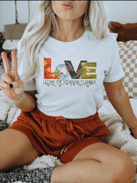Thumbnail for a woman sitting on a bed holding a peace sign