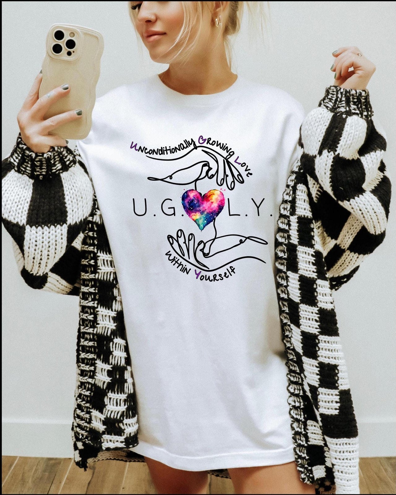 a woman taking a selfie with her cell phone