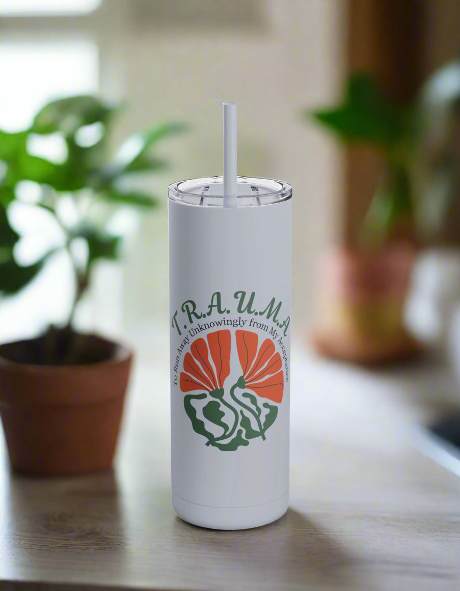 a stainless steel tumbler with a straw sticking out of it