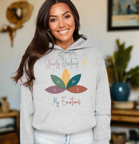 Thumbnail for a woman wearing a grey hoodie with a flower on it