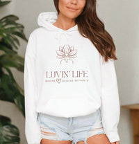 Thumbnail for a woman wearing a white hoodie with the luvin'life logo on it