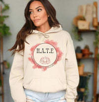 Thumbnail for a woman wearing a hoodie with the word hate on it