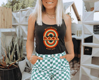 Thumbnail for a woman wearing a black tank top and checkered shorts