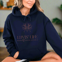 Thumbnail for a woman sitting on the ground wearing a blue hoodie