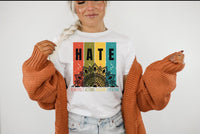 Thumbnail for a woman wearing a white shirt with the words hate on it