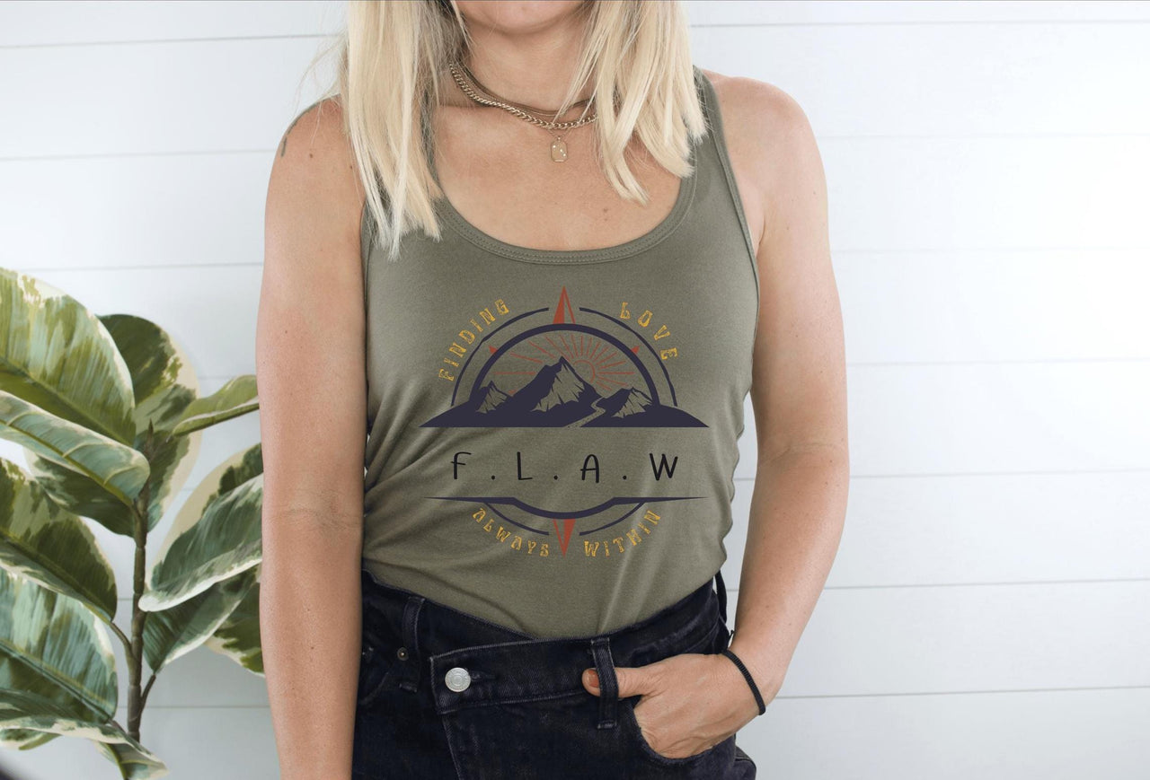 a woman wearing a tank top with the word law printed on it
