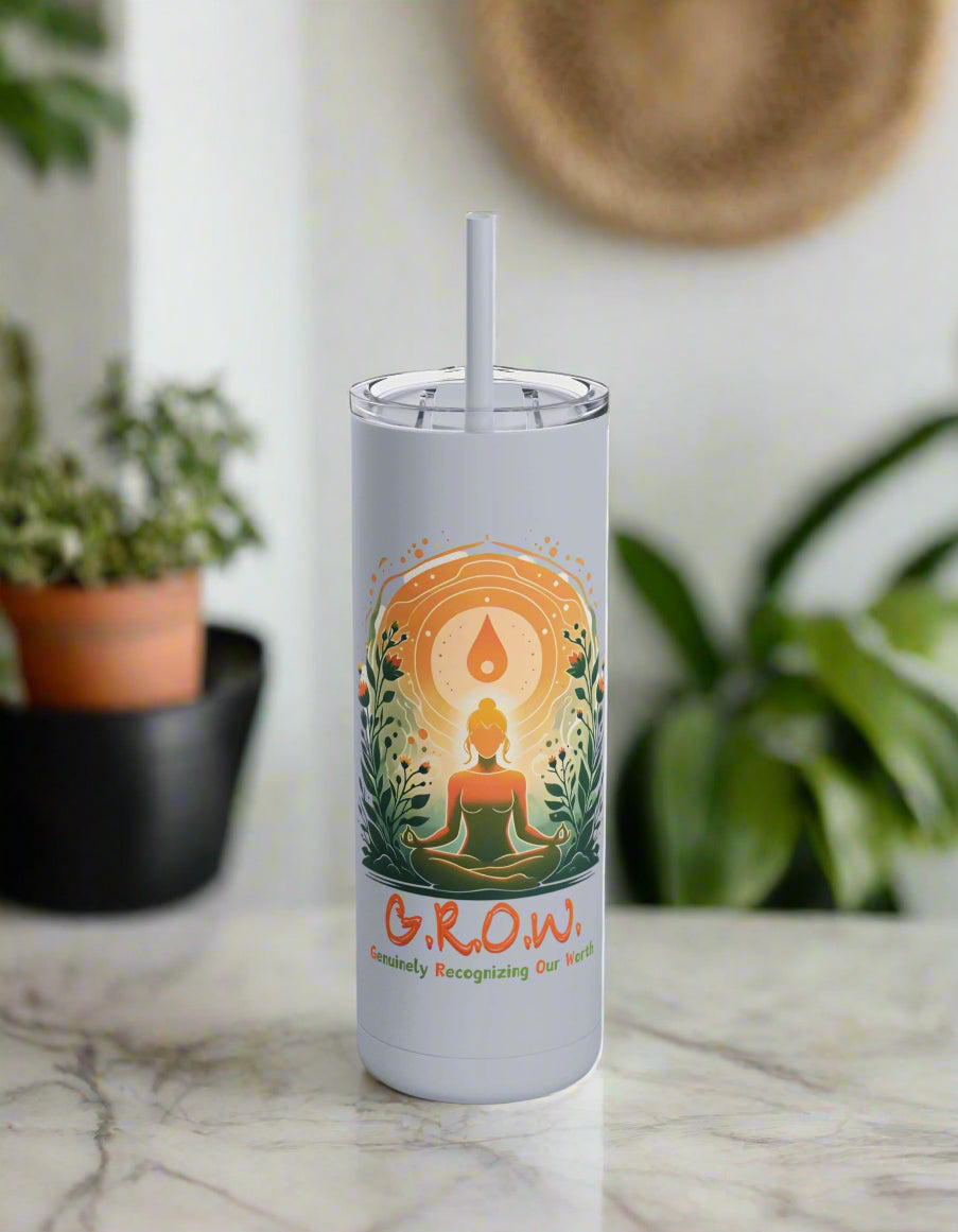 a stainless steel tumbler with a picture of a buddha on it