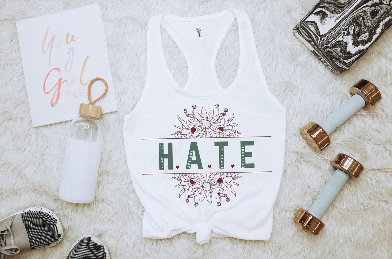 a white tank top with the word hate printed on it