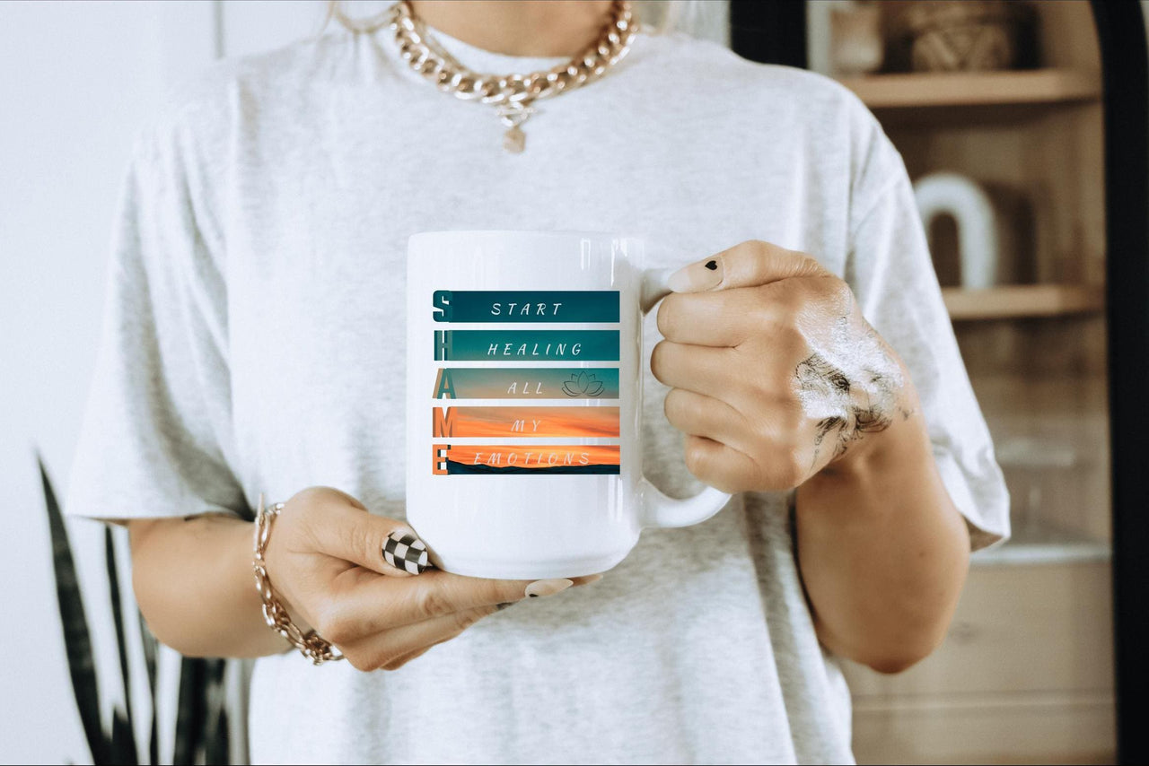 a woman holding a coffee mug in her hands