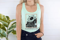 Thumbnail for a woman wearing a green tank top with a sunflower on it