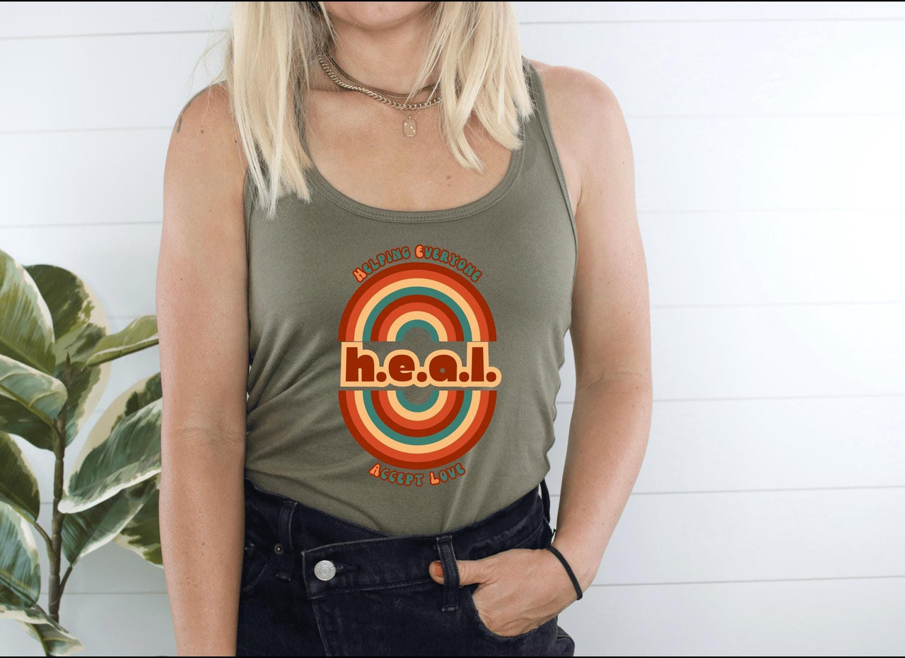 a woman wearing a tank top with the word hool on it